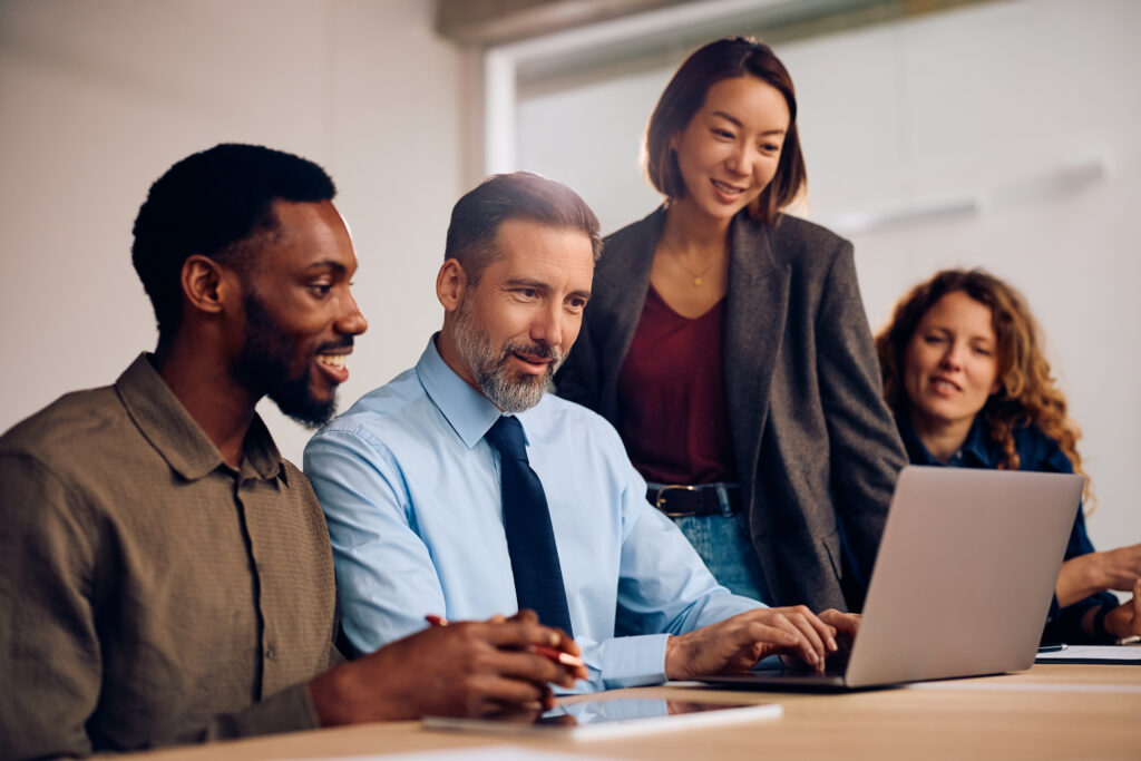A group of people knowing the importance of collaboration in making sales scripts